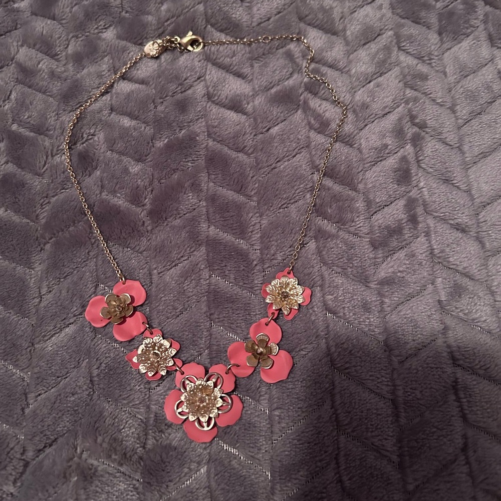 Gold necklace with pink flowers